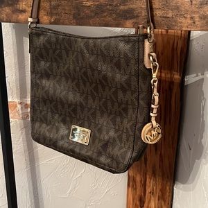 Michael Kors brown and tan logo messenger purse